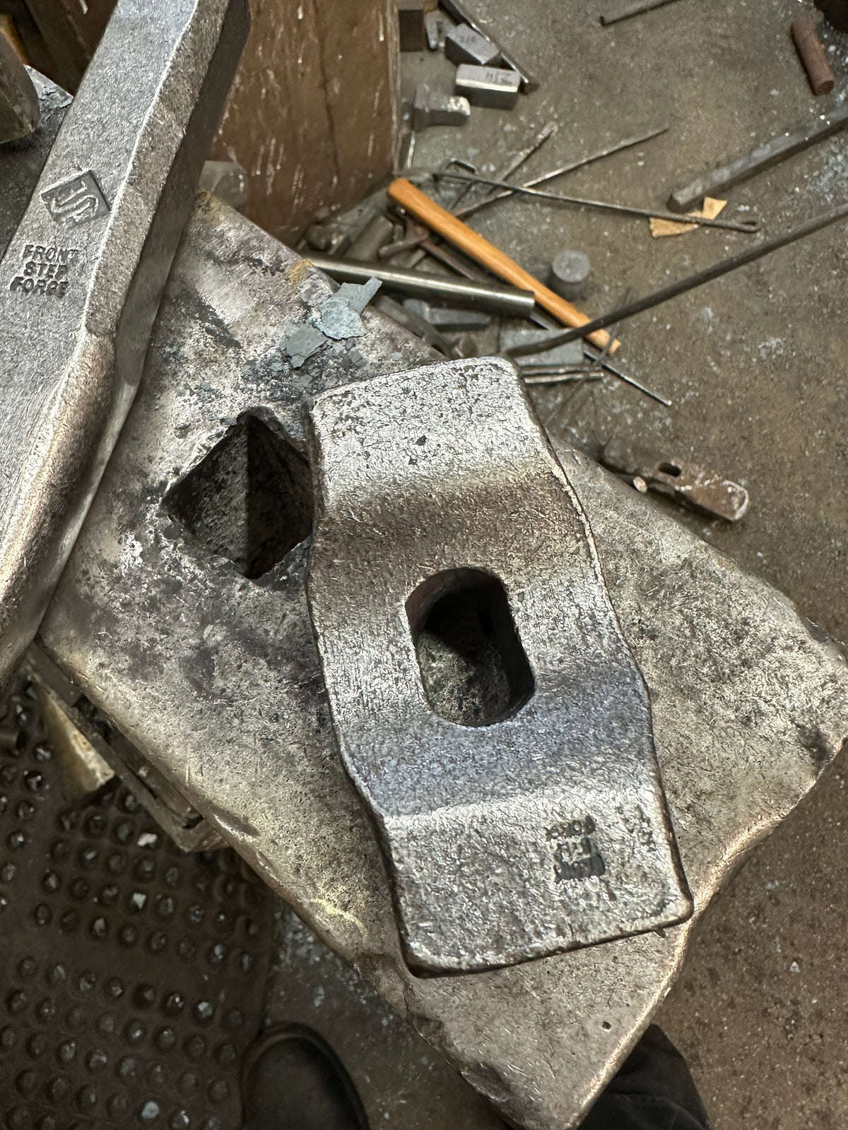Hammer eye forging bolster