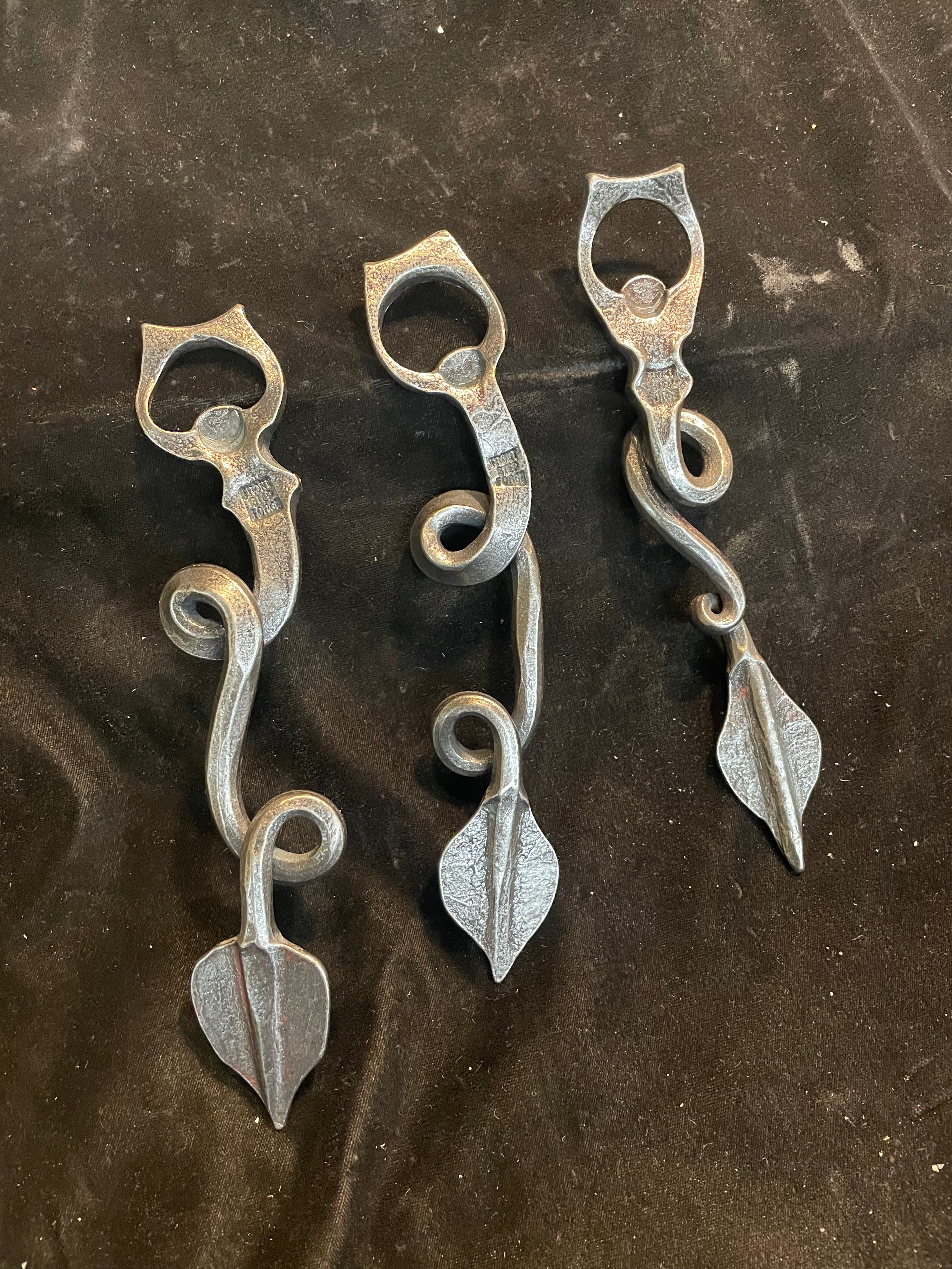 Dragon tail bottle openers
