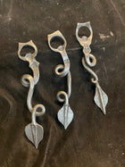 Dragon tail bottle openers