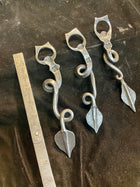 Dragon tail bottle openers