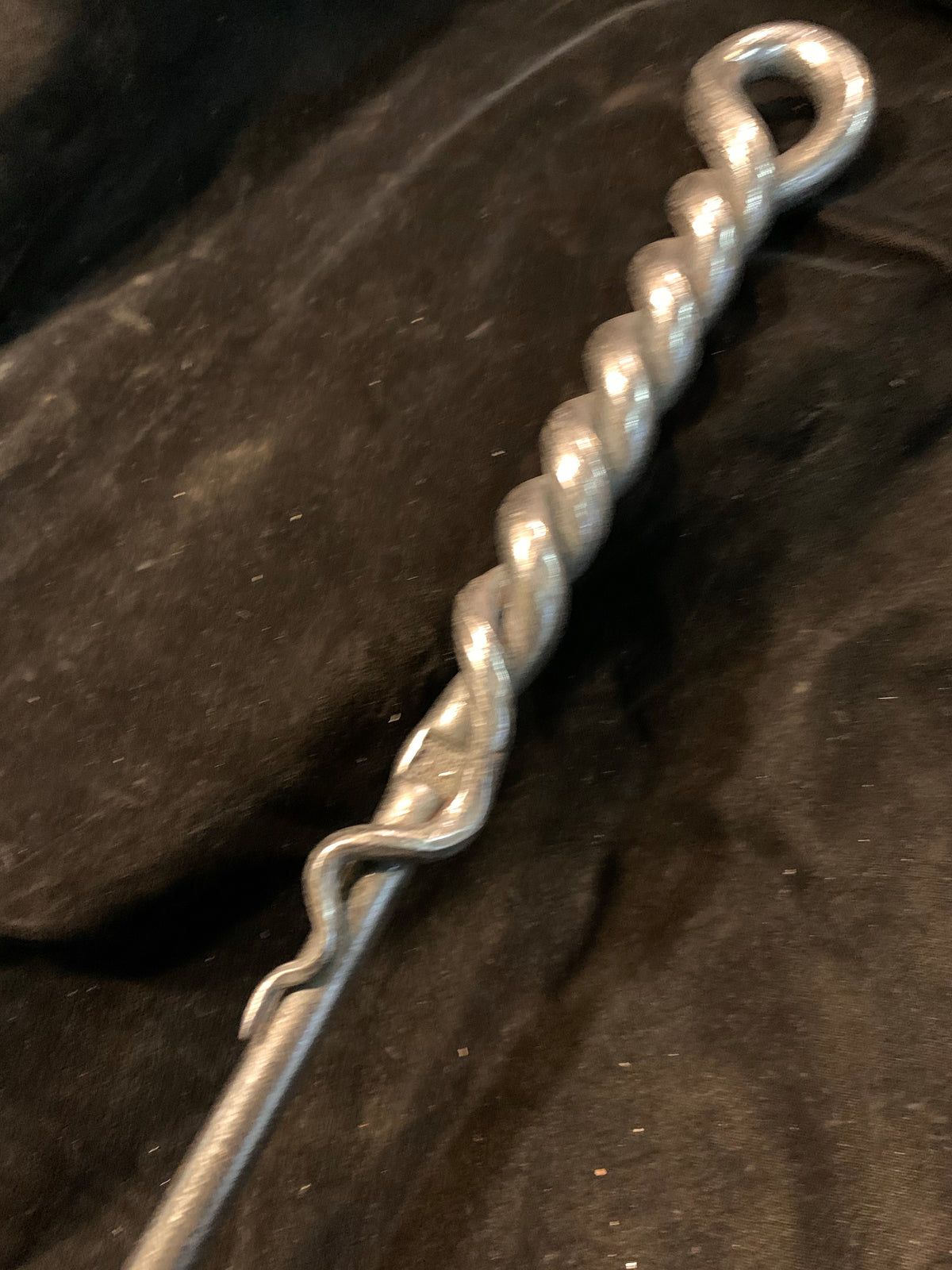 Twisted fire poker