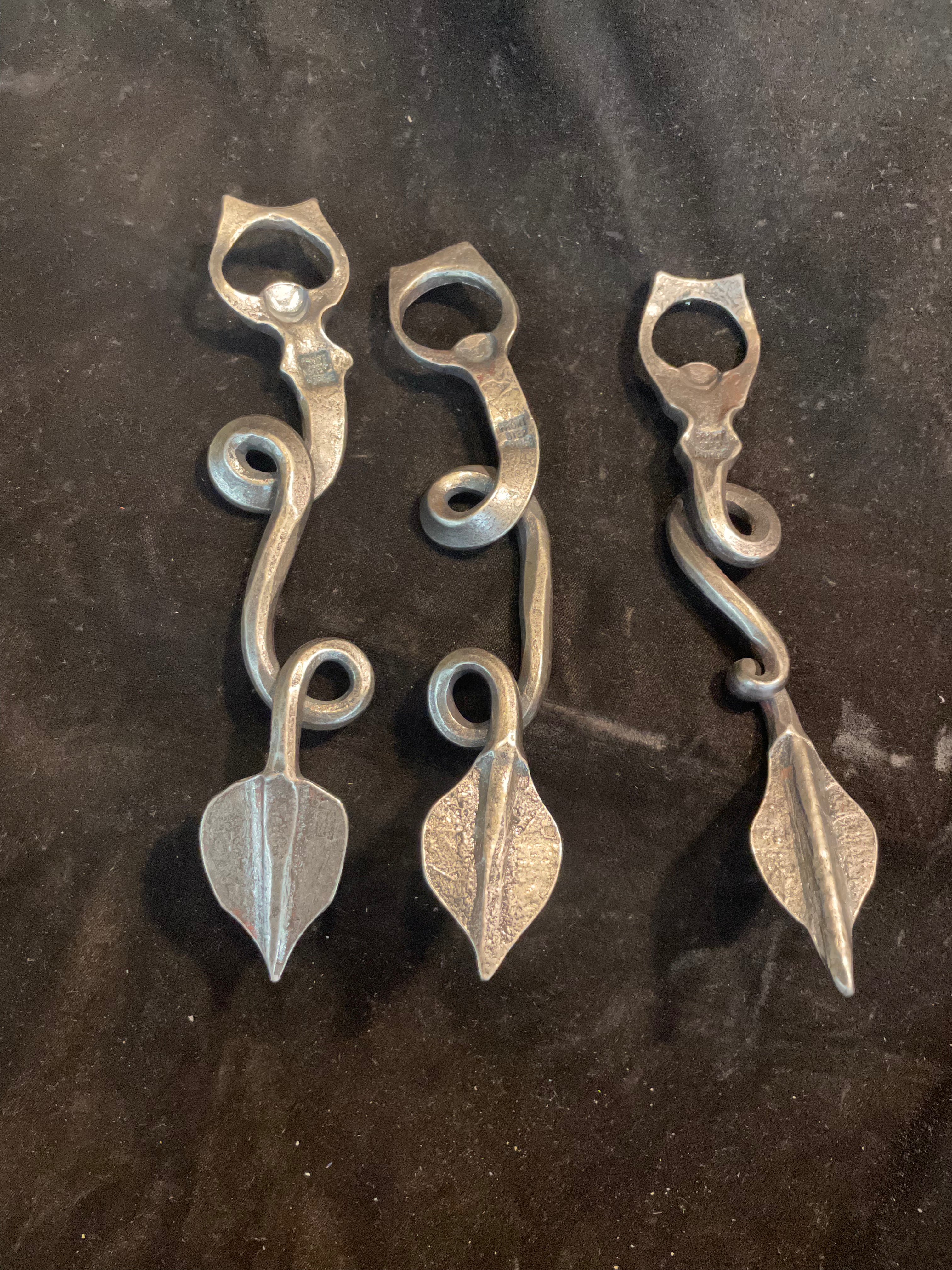 Dragon tail bottle openers