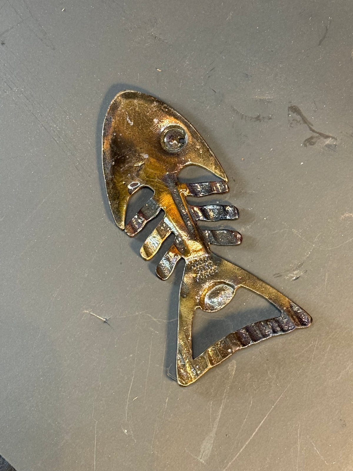 Fish bone bottle opener