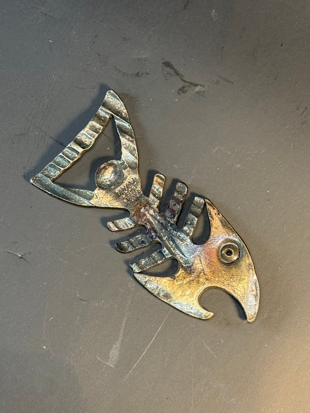 Fish bone bottle opener
