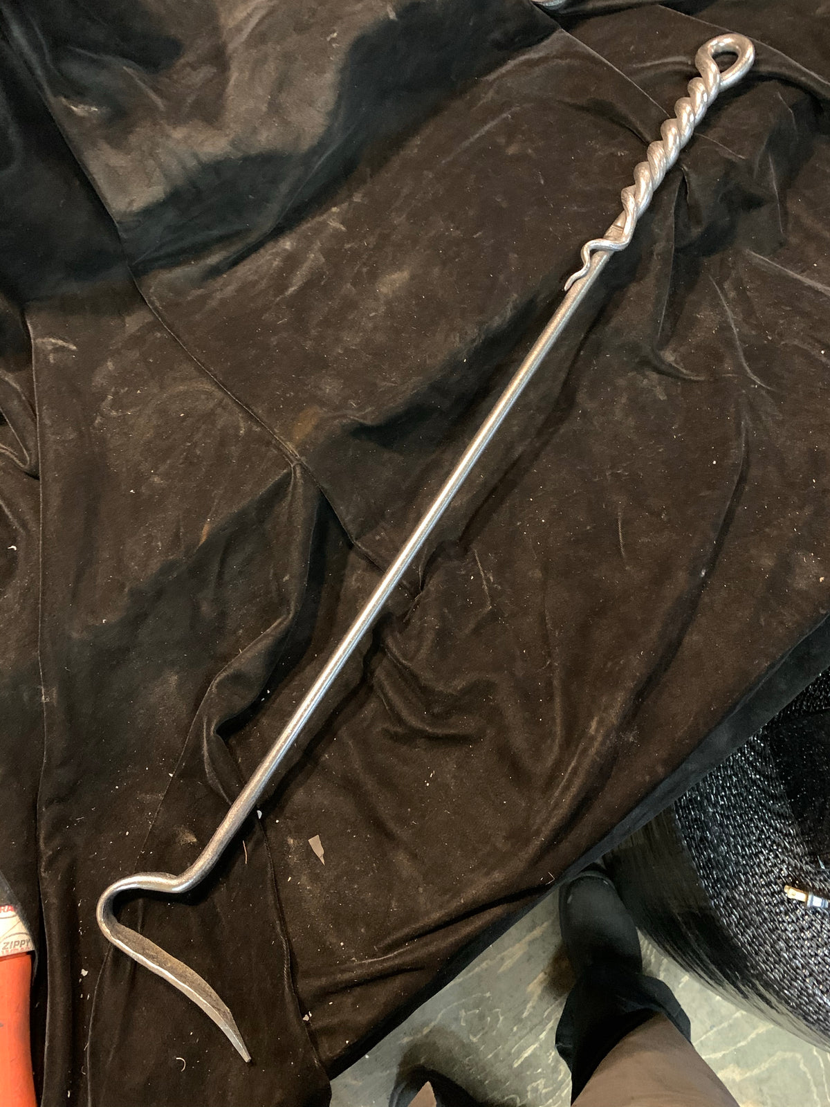 Twisted fire poker