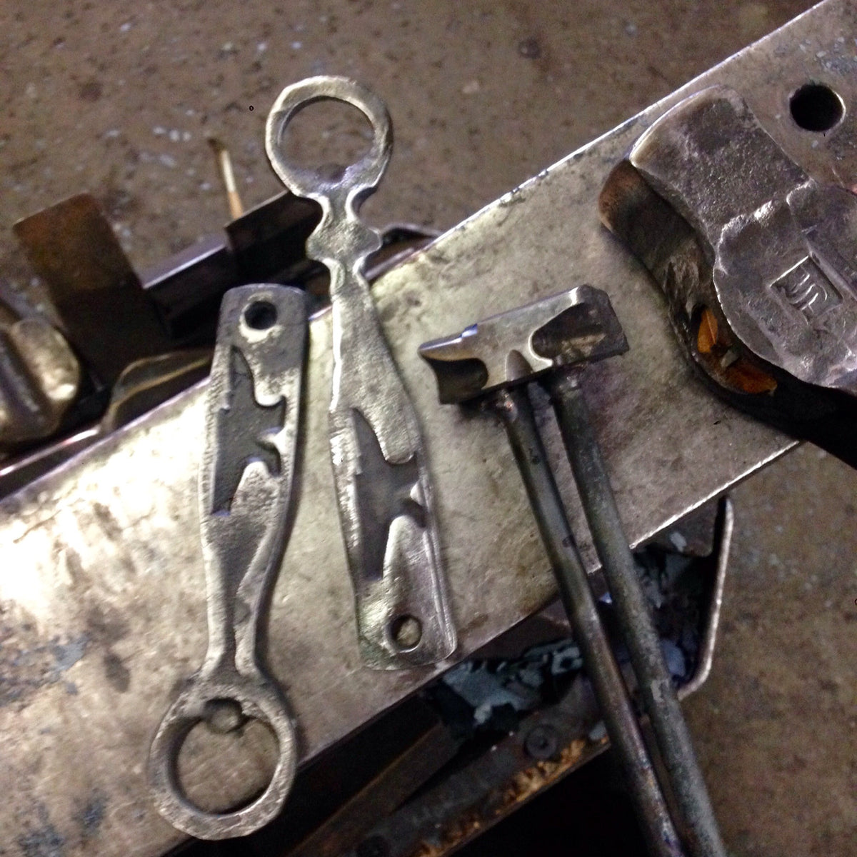 Anvil bottle opener